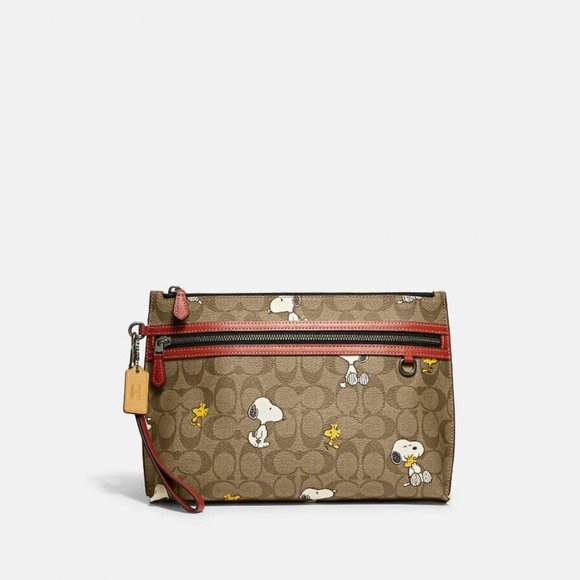 Coach X Peanuts Men's Carry All Pouch Leather Canvas Snoopy Woodstock Wristlet - Picture 1 of 2